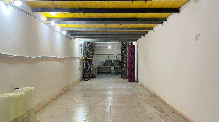 Safi - Semi Basement garage 45ft x 10ft.