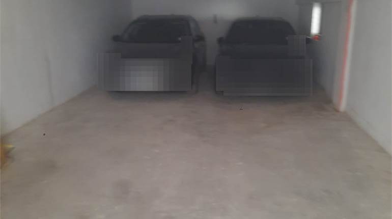Pieta - Street Level Garage 
