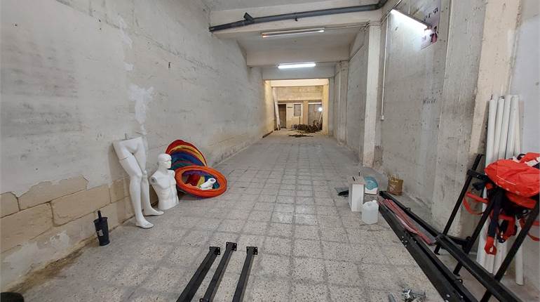 Paola - Street Level Garage approx 13ft/98ft - Water & Electricity installed 